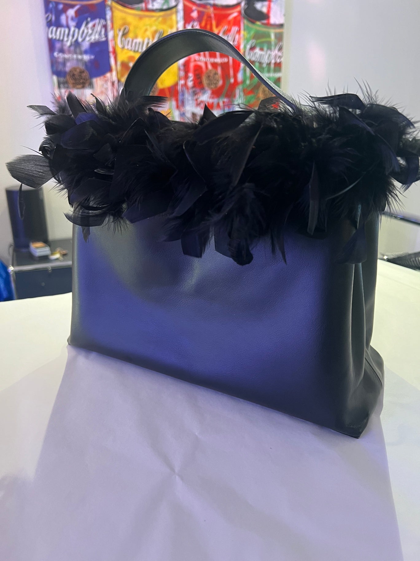 Tasche mit Federn