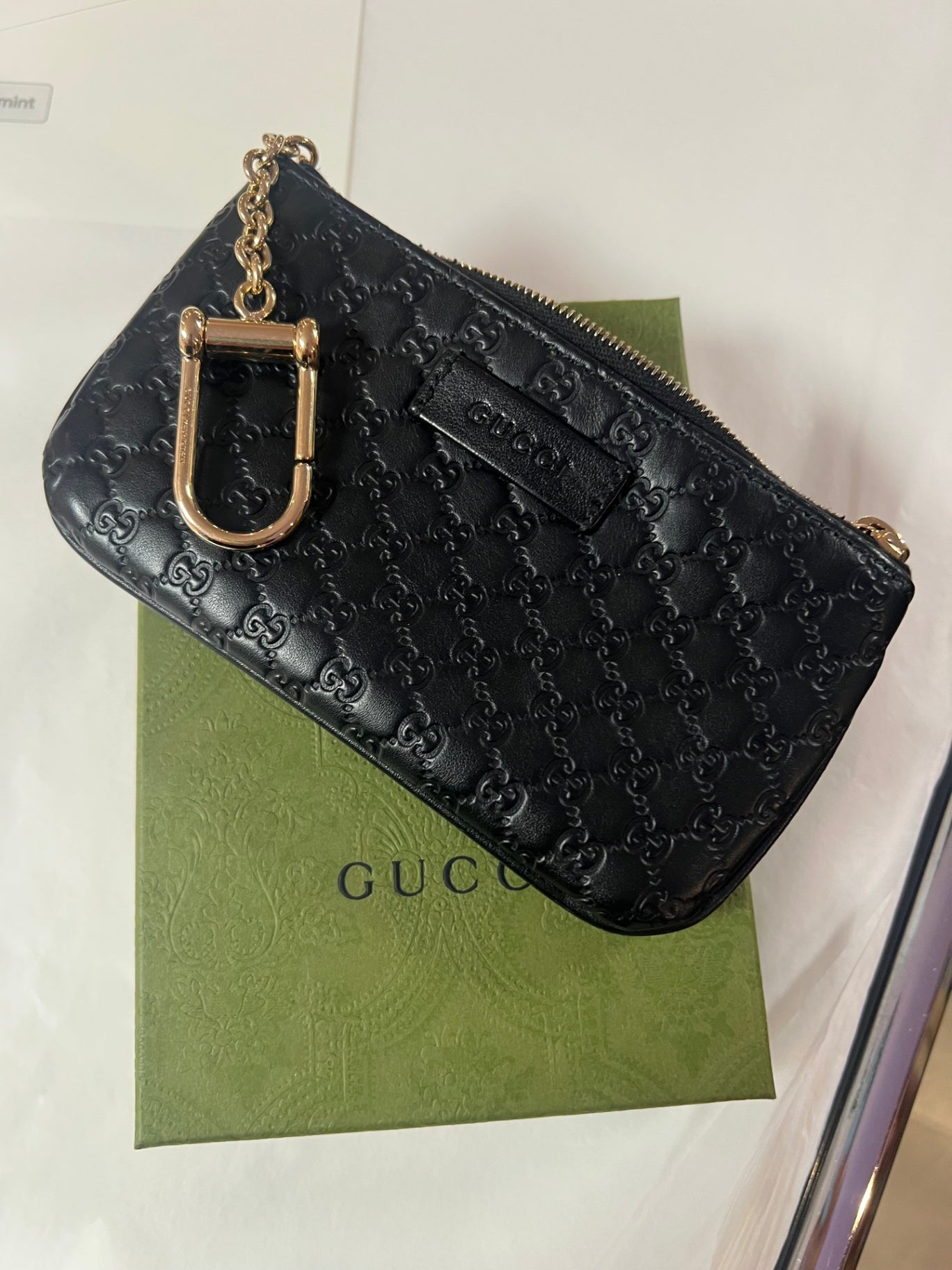 Gucci Emblem Schlüsseletui mit Reissverschluss