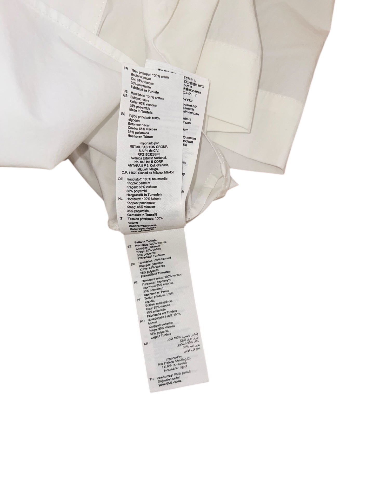 Pre-Loved Sandro Bluse mit Häkelkragen