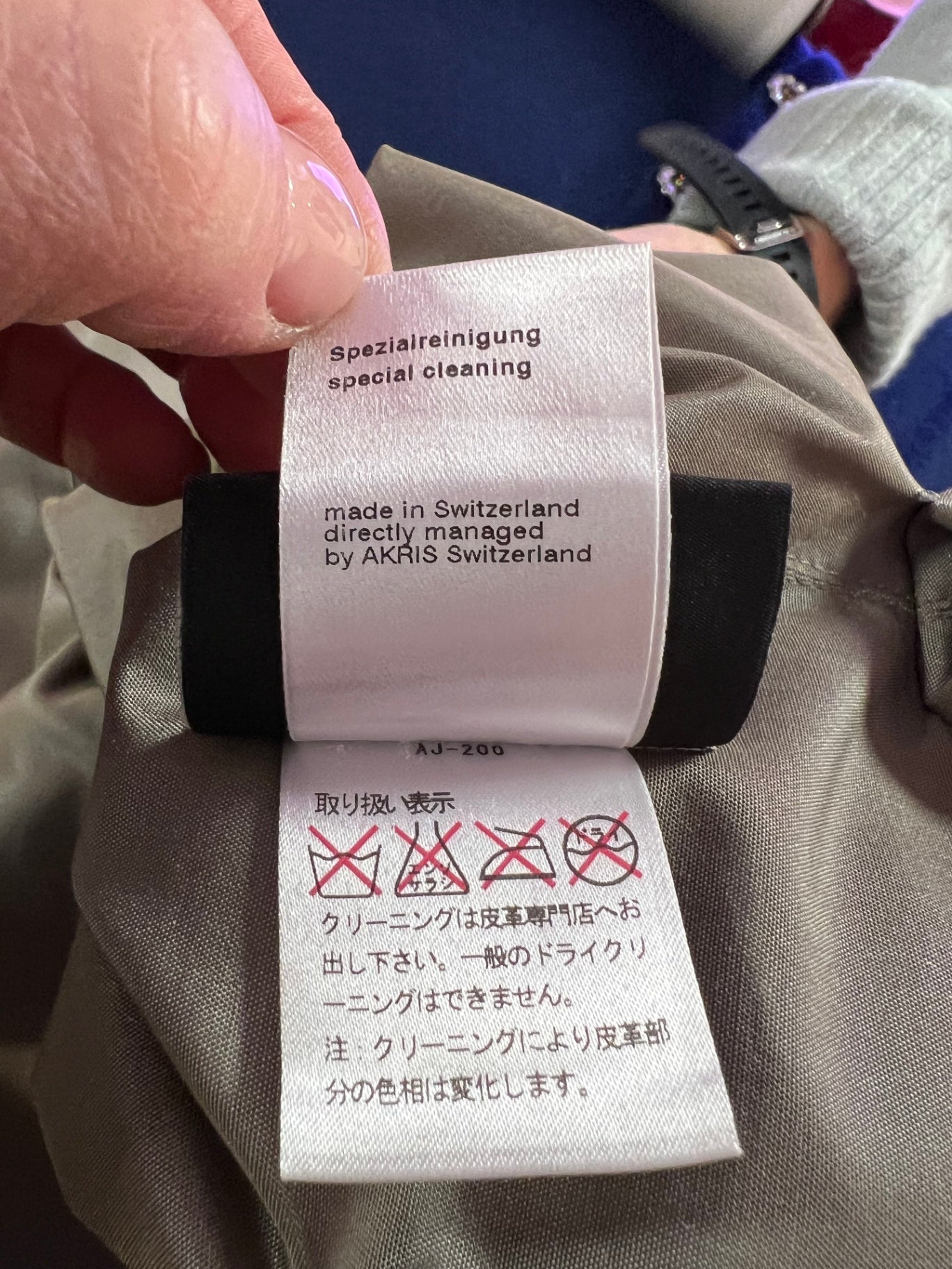 Pre-Loved AKRIS Lammfell Jacke reversible