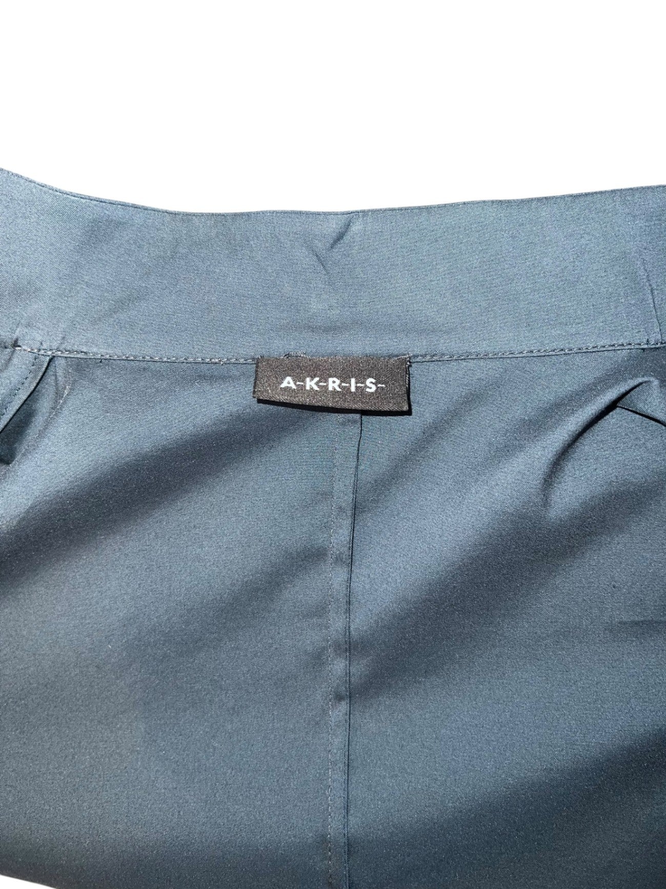 Pre-Loved Akris asymmetrische Plissee-Bluse Petrol